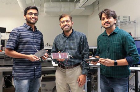 UCF researchers Kowsik Sambath Kumar, Jayan Thomas, and Deepak Pandey show the lightweight, supercapacitor-battery hybrid composite material they’ve developed. Kumar and Pandey are UCF doctoral students, and Thomas is a professor in UCF’s NanoScience Technology Center and Department of Materials Science and Engineering.